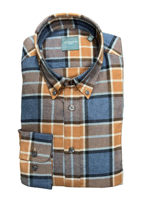 A folded long-sleeve plaid button-down shirt by Leo Chevalier, featuring a mix of blue, orange, brown, and beige colors, laid flat on a green textured carpet.