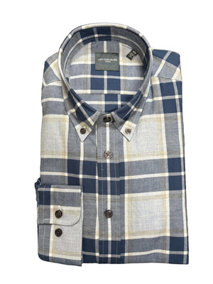 A folded men's button-down shirt by Leo Chevalier, featuring a blue, white, and beige plaid pattern, laid flat on a textured carpet background.