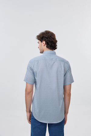 Chemise sans repassage 100 % coton à pois bleus Léo Chevalier
